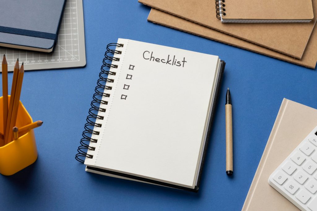 top-view-notebook-checklist-desk
